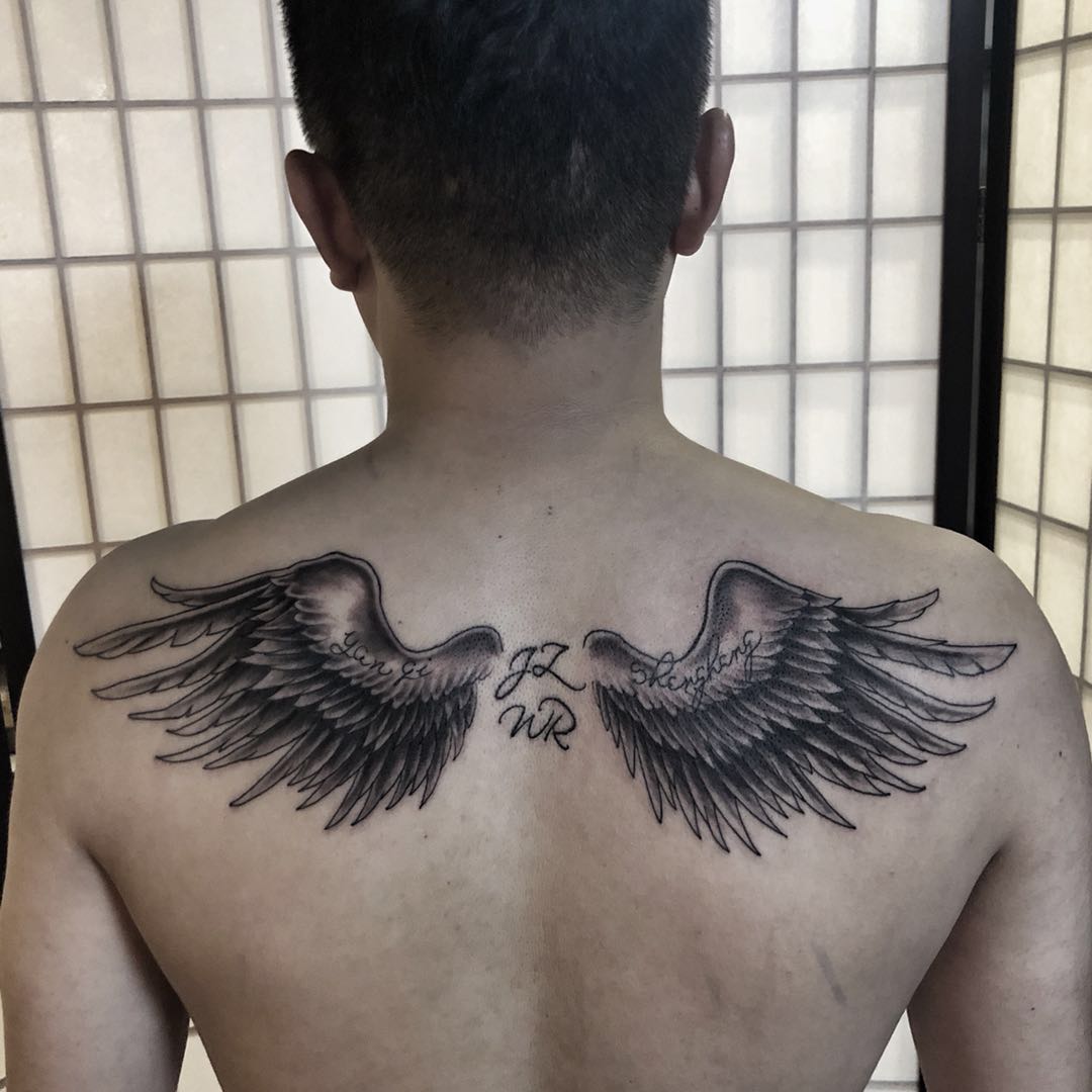 手臂天使纹身_上海纹身 上海纹身店 上海由龙纹身2号工作室